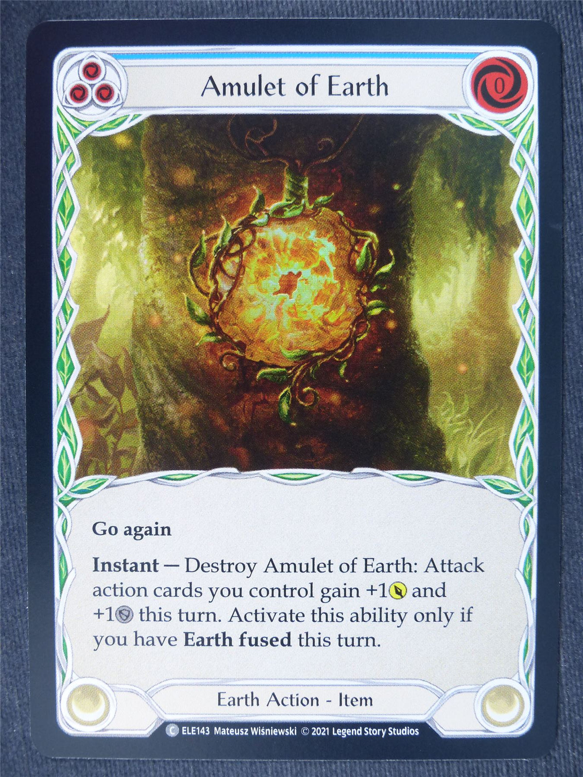 Amulet of Earth C Foil Blue - 1st Ed Tales of Aria - Flesh and Blood