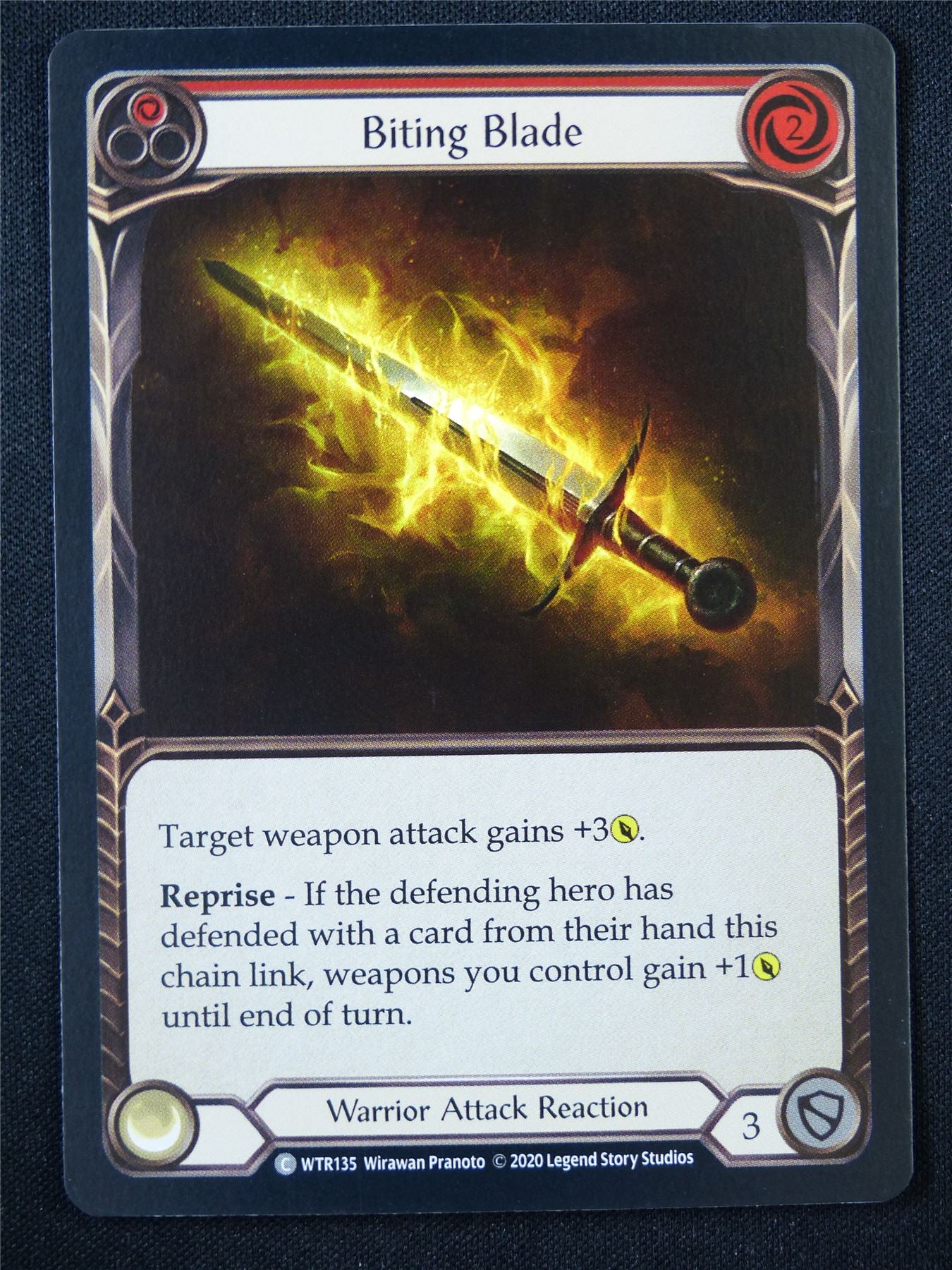 Biting Blade Red WTR135 Foil - Flesh and Blood Card #396