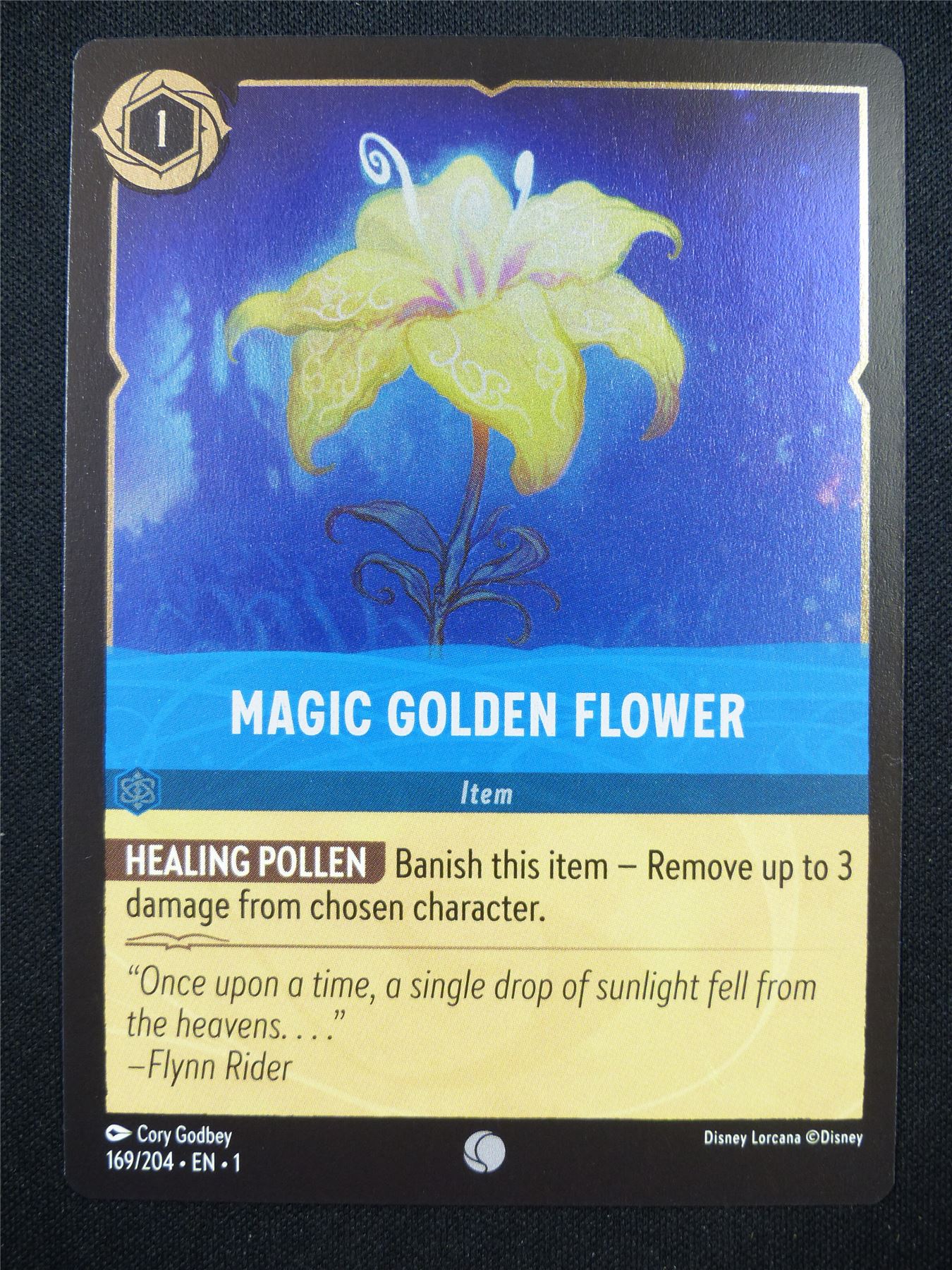 Magic Golden Flower 169/204 Foil - Lorcana Card #MK Archeron Magic Golden Flower 169/204 Foil - Lorcana Card #MK Archeron