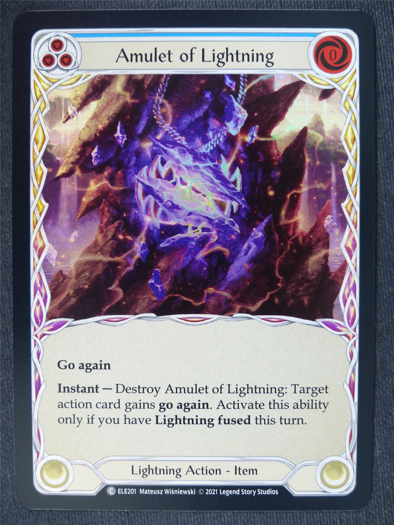 Amulet of Lightning C Foil Blue - 1st Ed Tales of Aria - Flesh and Blood