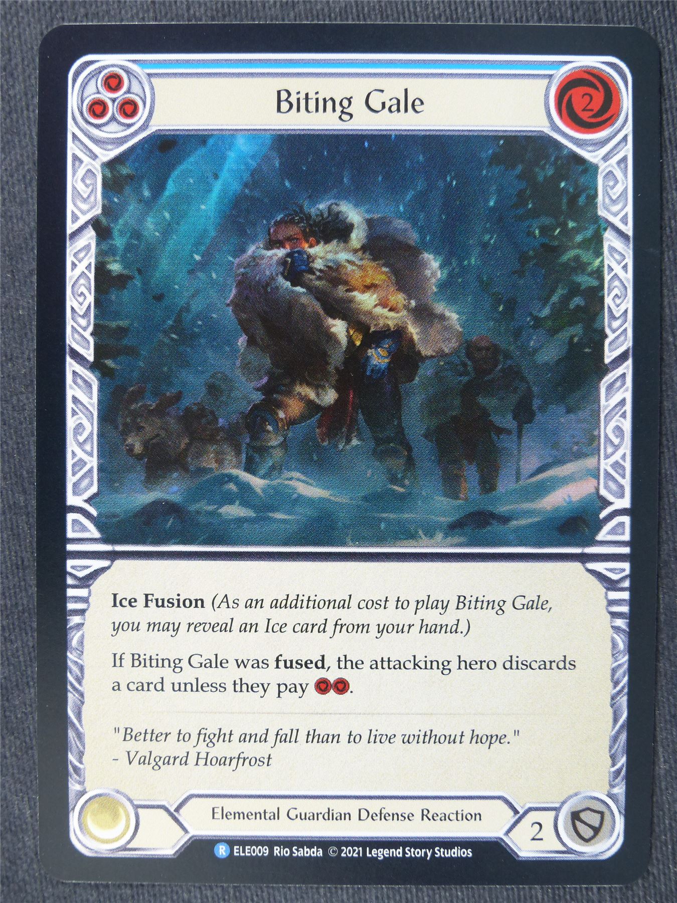 Biting Gale R Foil Blue - 1st Ed Tales of Aria - Flesh and Blood