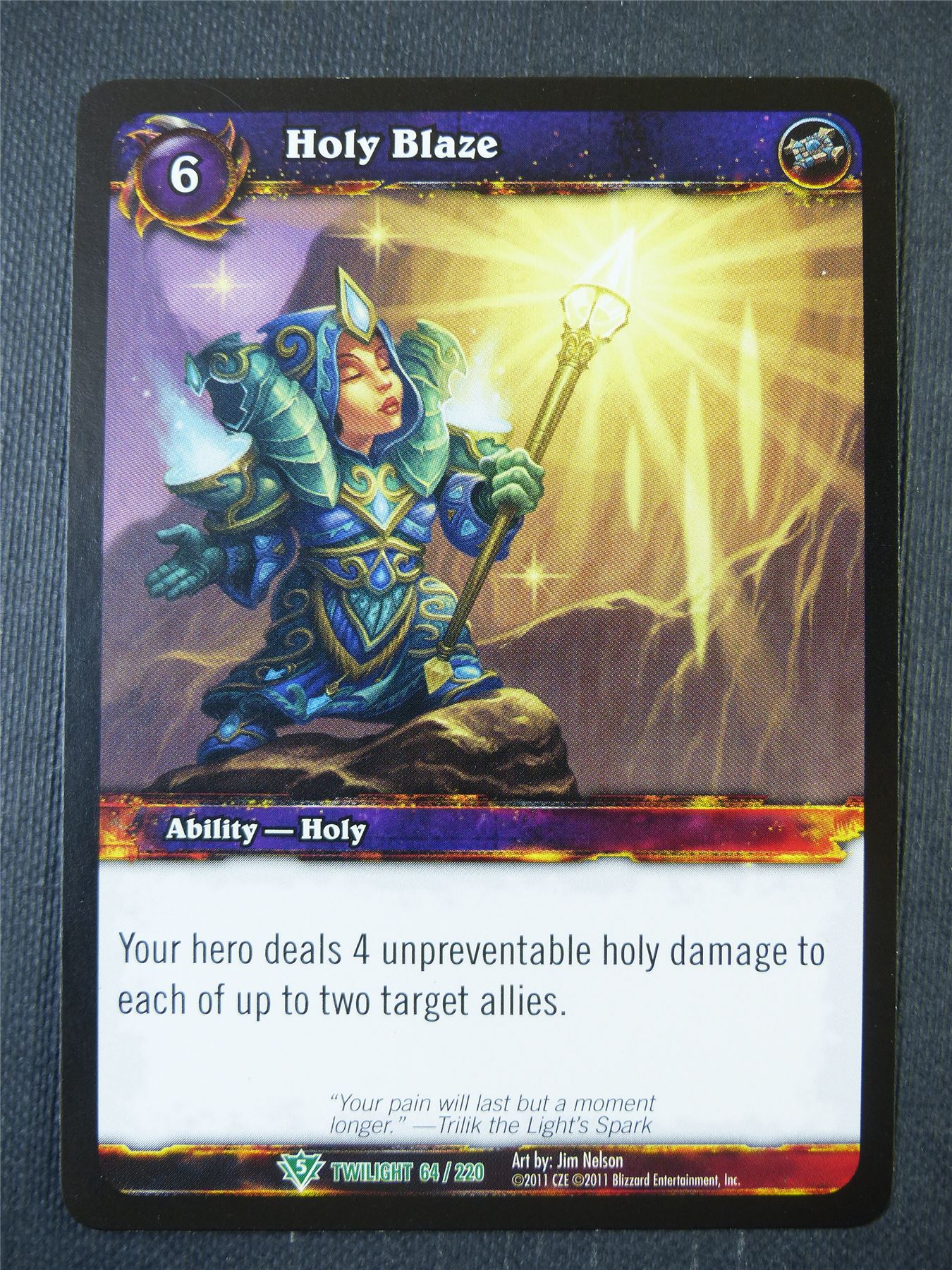 Holy Blaze 64/220 - WoW Card #131