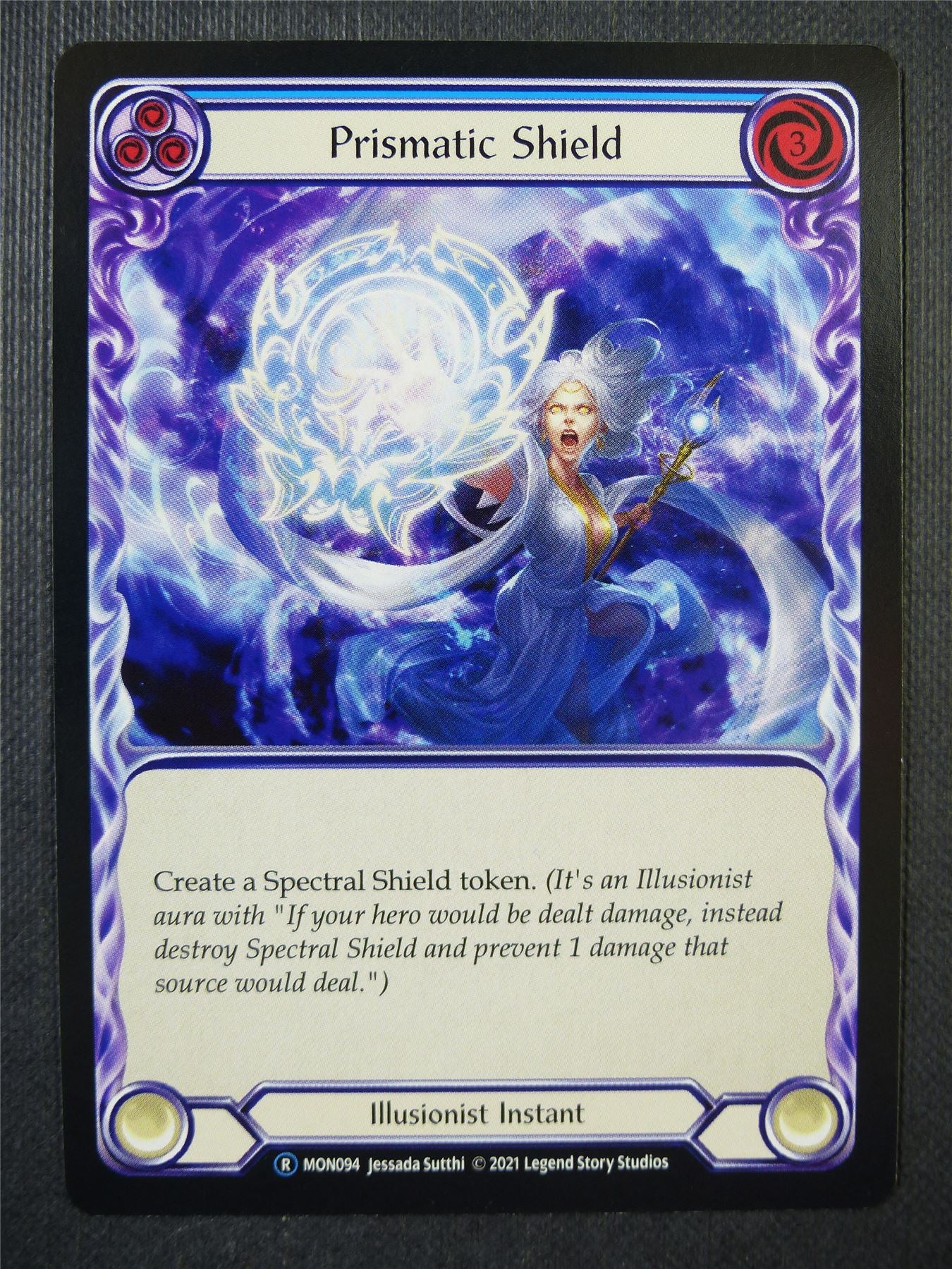 Prismatic Shield R MON094 - Blue - Flesh & Blood Card #6VK