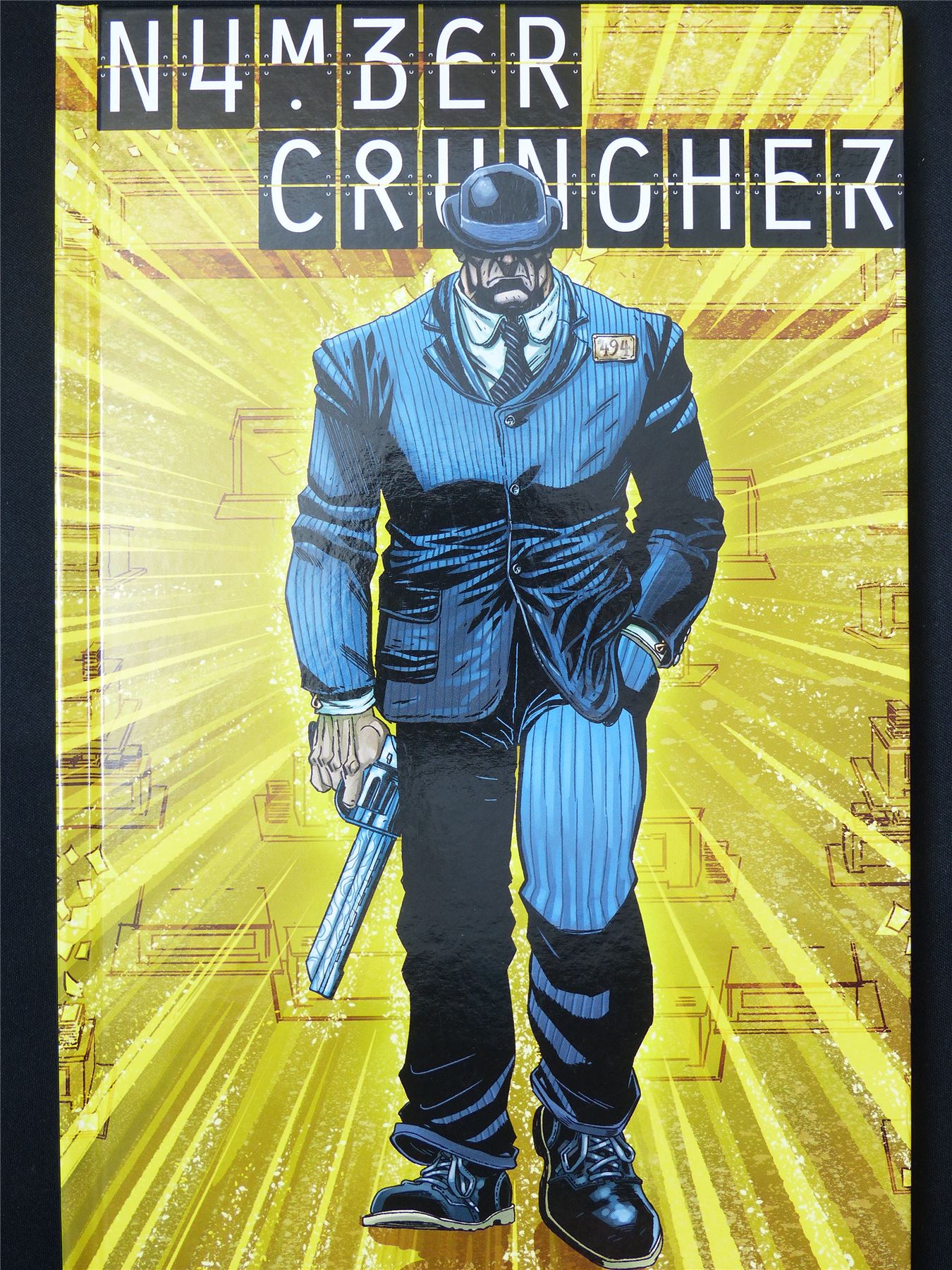 Number Cruncher - Titan Grpahic Hardback #2OJ