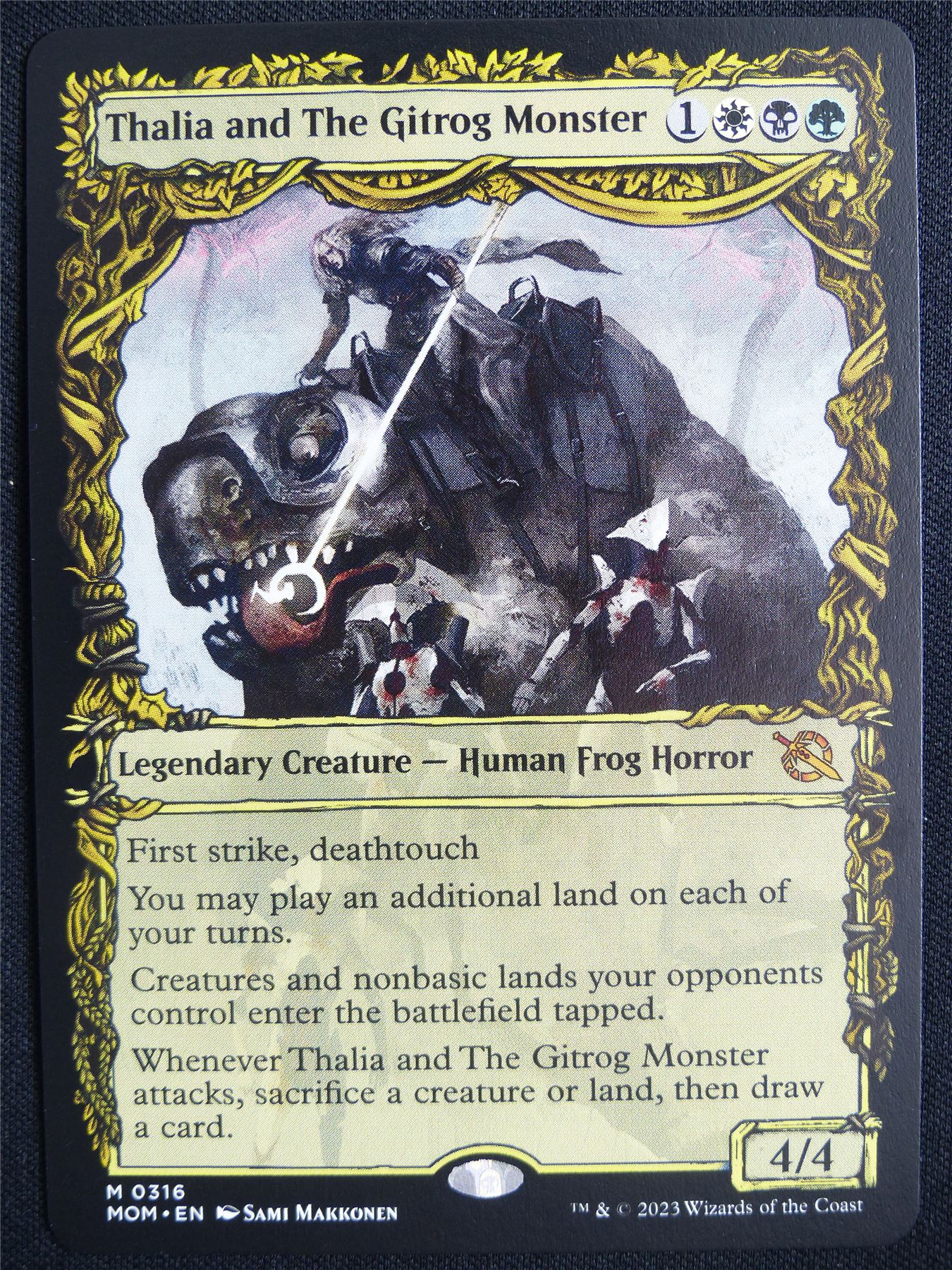 Thalia and The Gitrog Monster Showcase - MOM - Mtg Card #5N1
