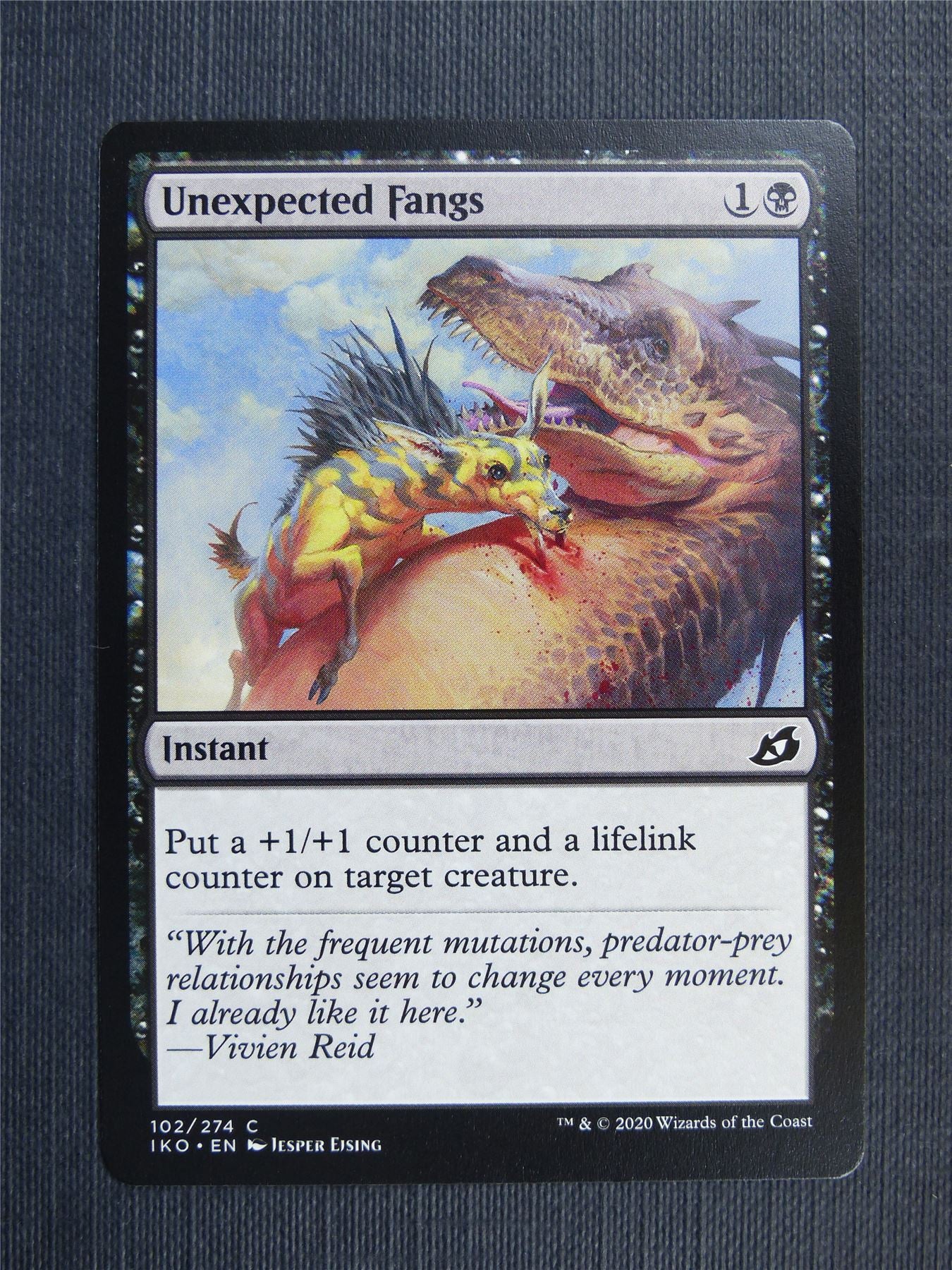 Unexpected Fangs - IKO Mtg Card