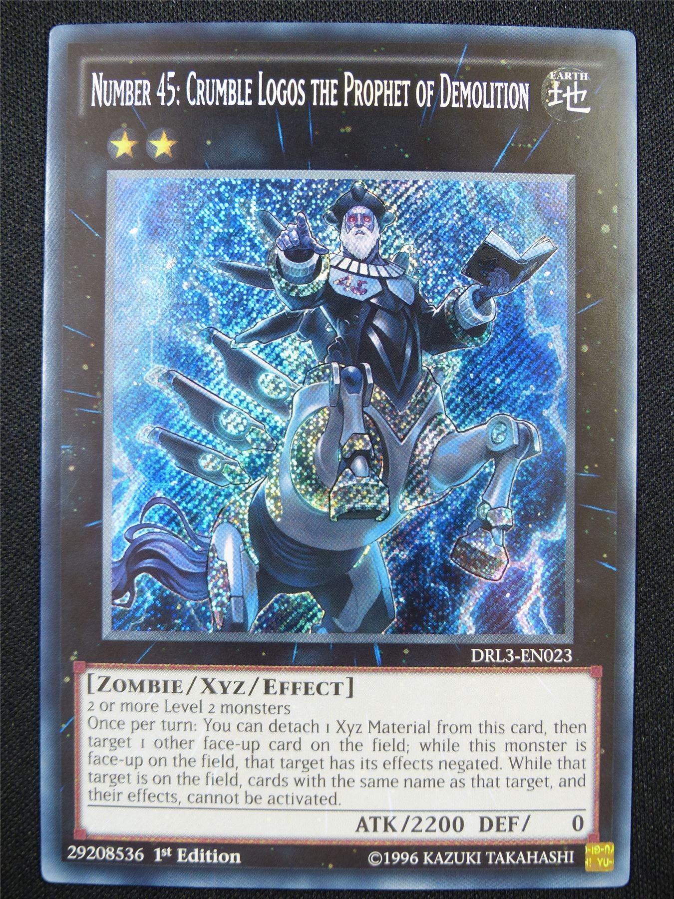 Number 45: Crumble Logos the Prophet of Demolition DRL3 Secret Rare - 1st ed Yugioh Card #37H