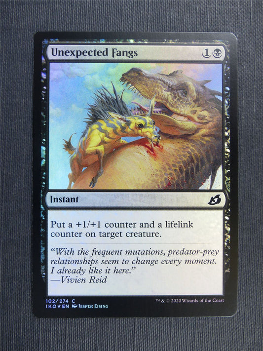 Unexpected Fangs Foil - IKO - Mtg Card
