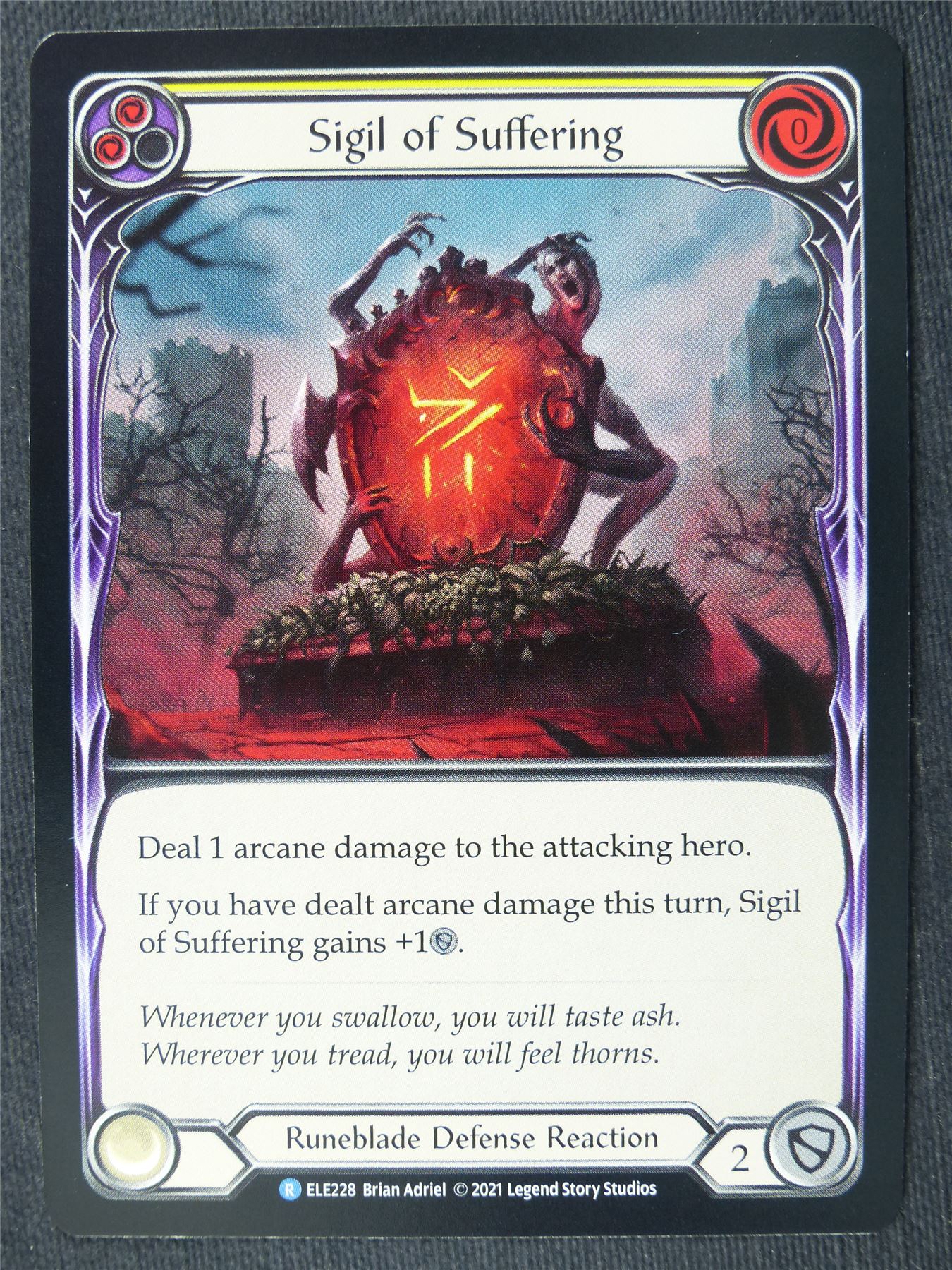 Sigil of Suffering R Yellow - 1st Ed Tales of Aria - Flesh and Blood