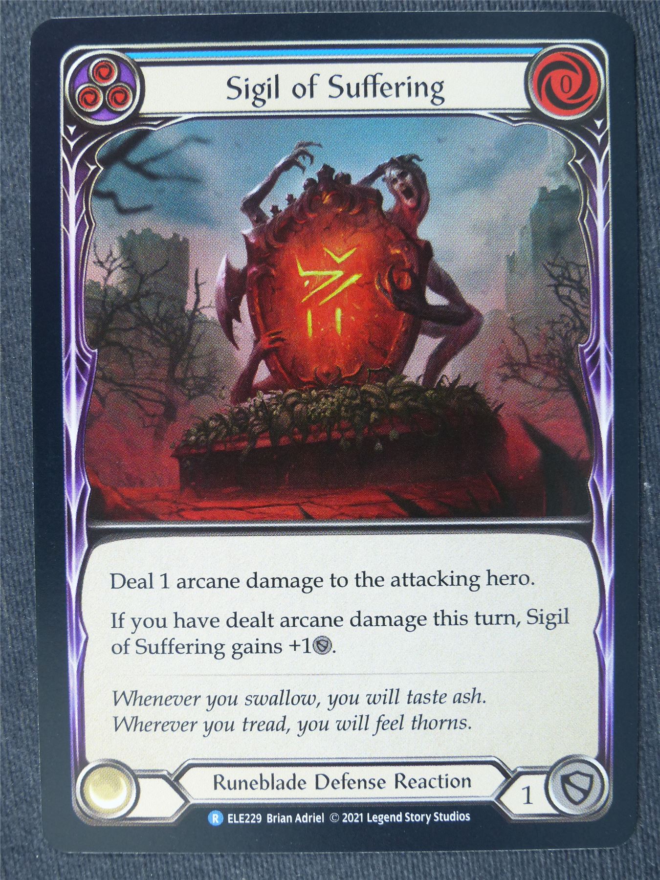 Sigil of Suffering R Foil Blue - 1st Ed Tales of Aria - Flesh and Blood